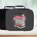 Black lunch bag with book stack design and text on a white surface