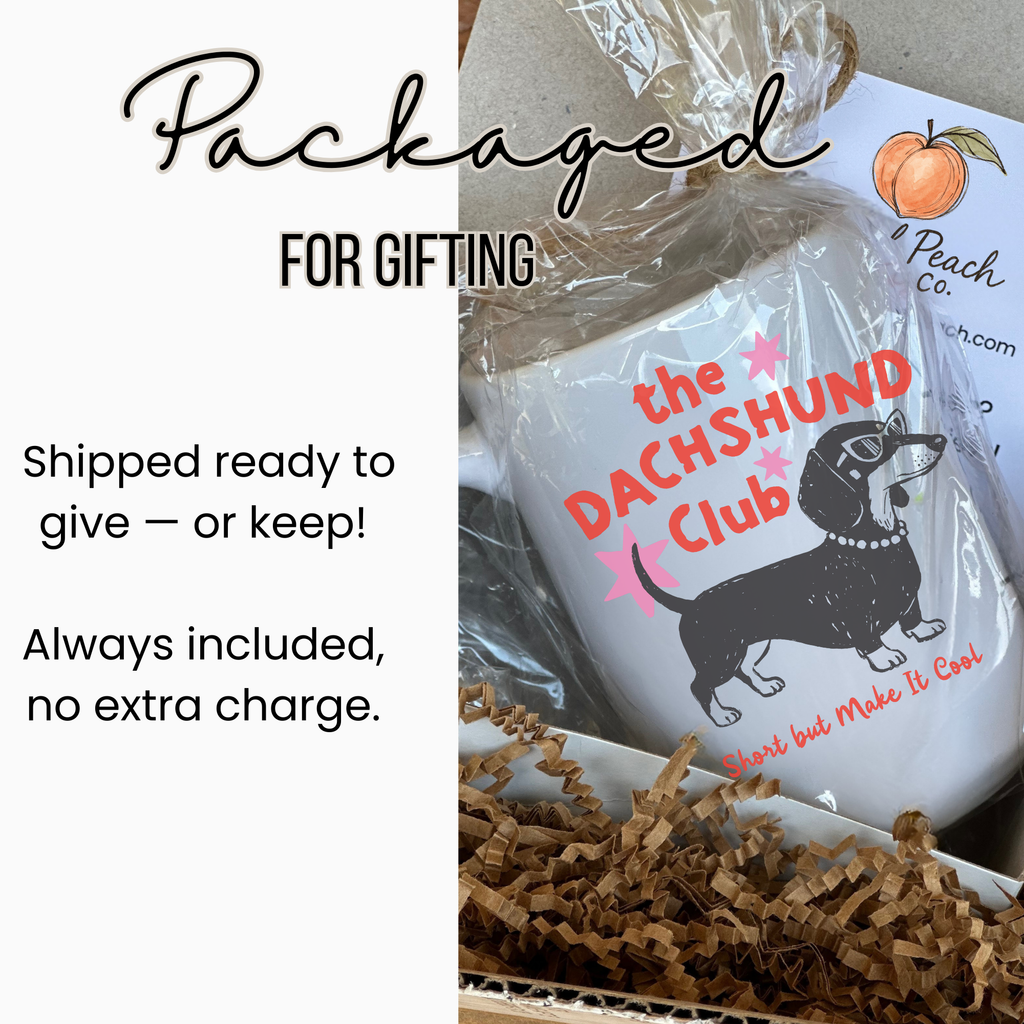 White 15oz. mug with 'the Dachshund Club' design in packaging, labeled 'Packaged for Gifting'.