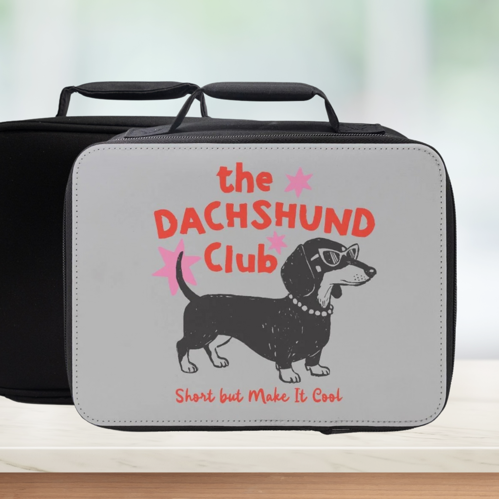 Lunch bag with a dachshund illustration and 'The Dachshund Club' text on a white background
