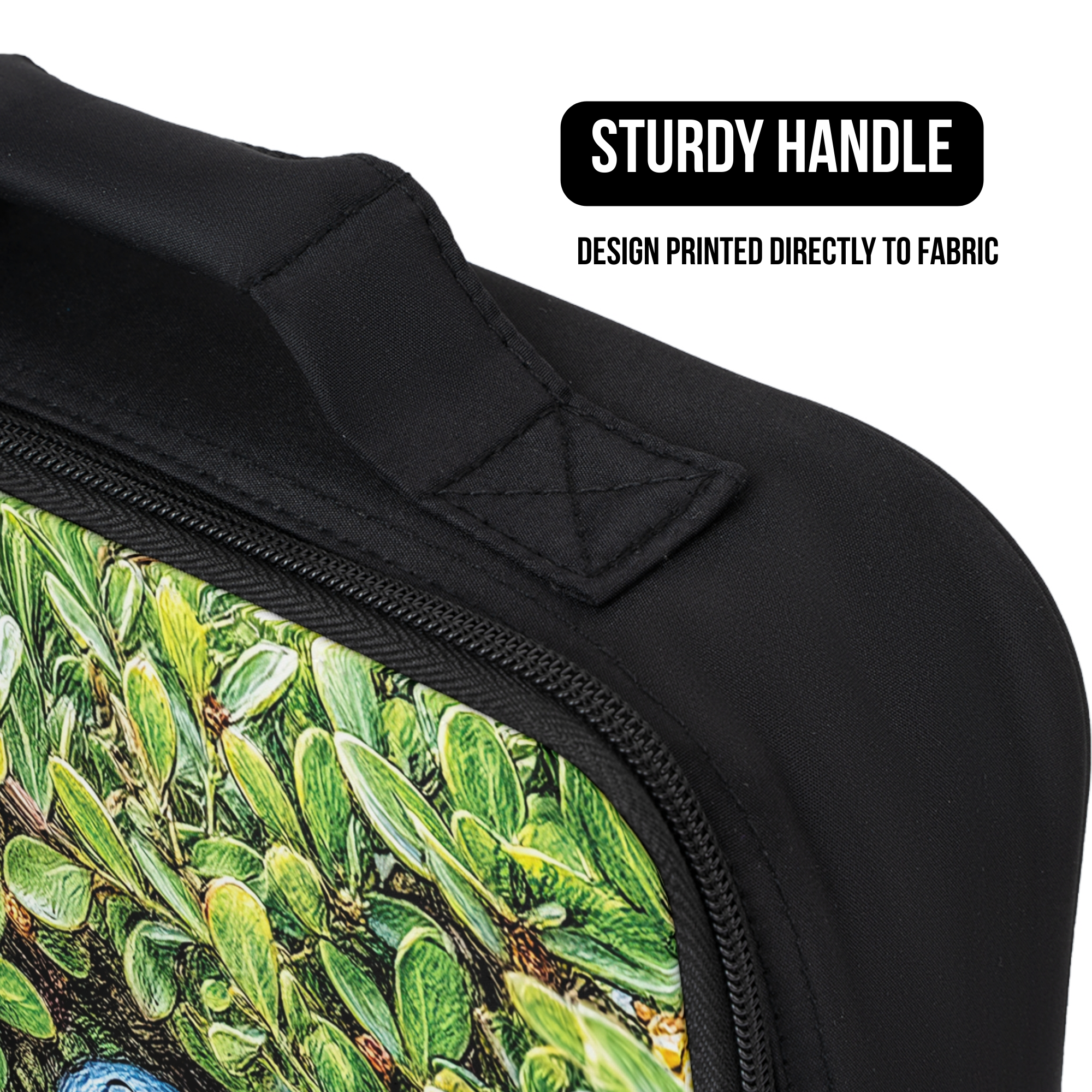 Close up of a black lunch bag with green leaf pattern and sturdy handle feature