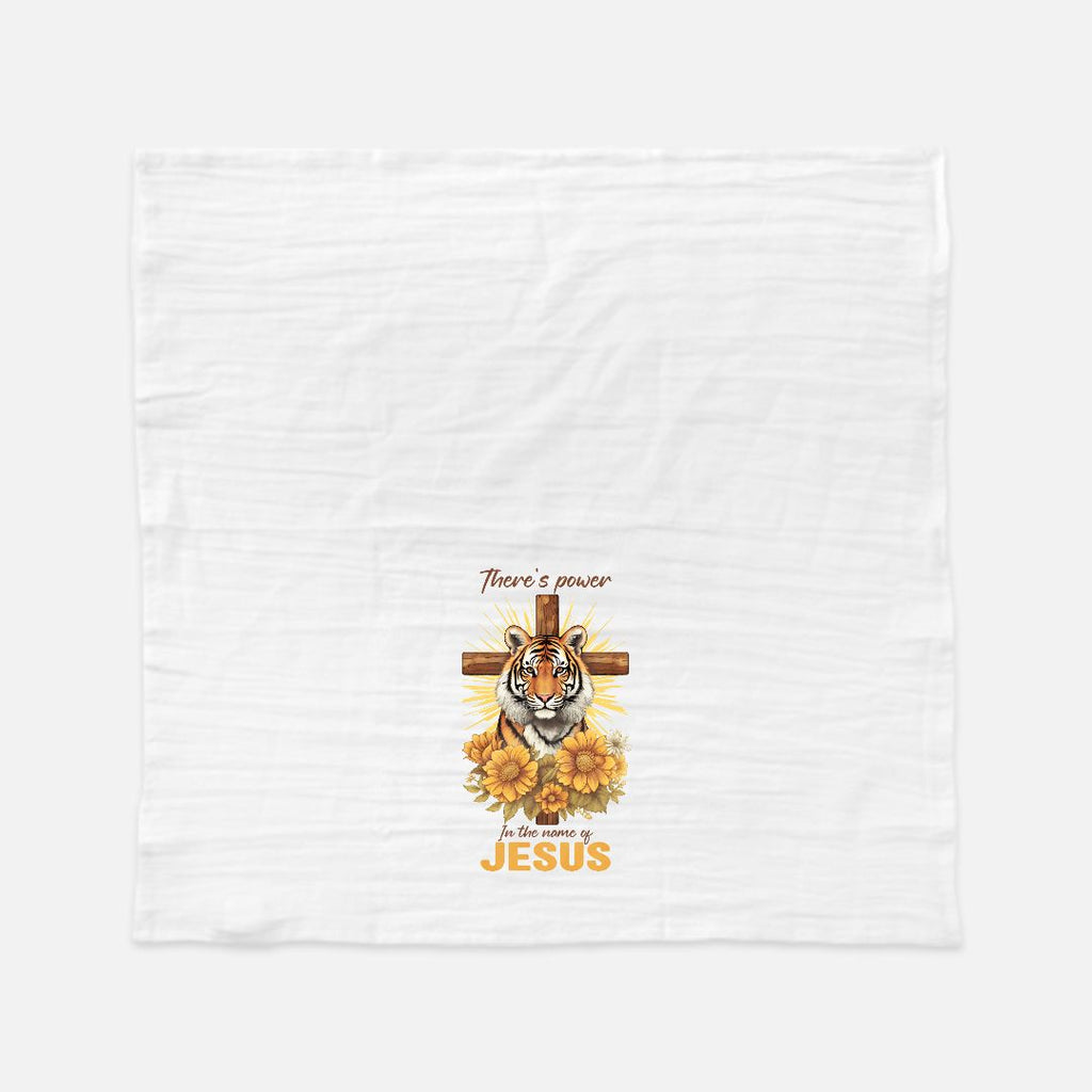 White tea towel with a tiger, cross, and sunflower design on a white background