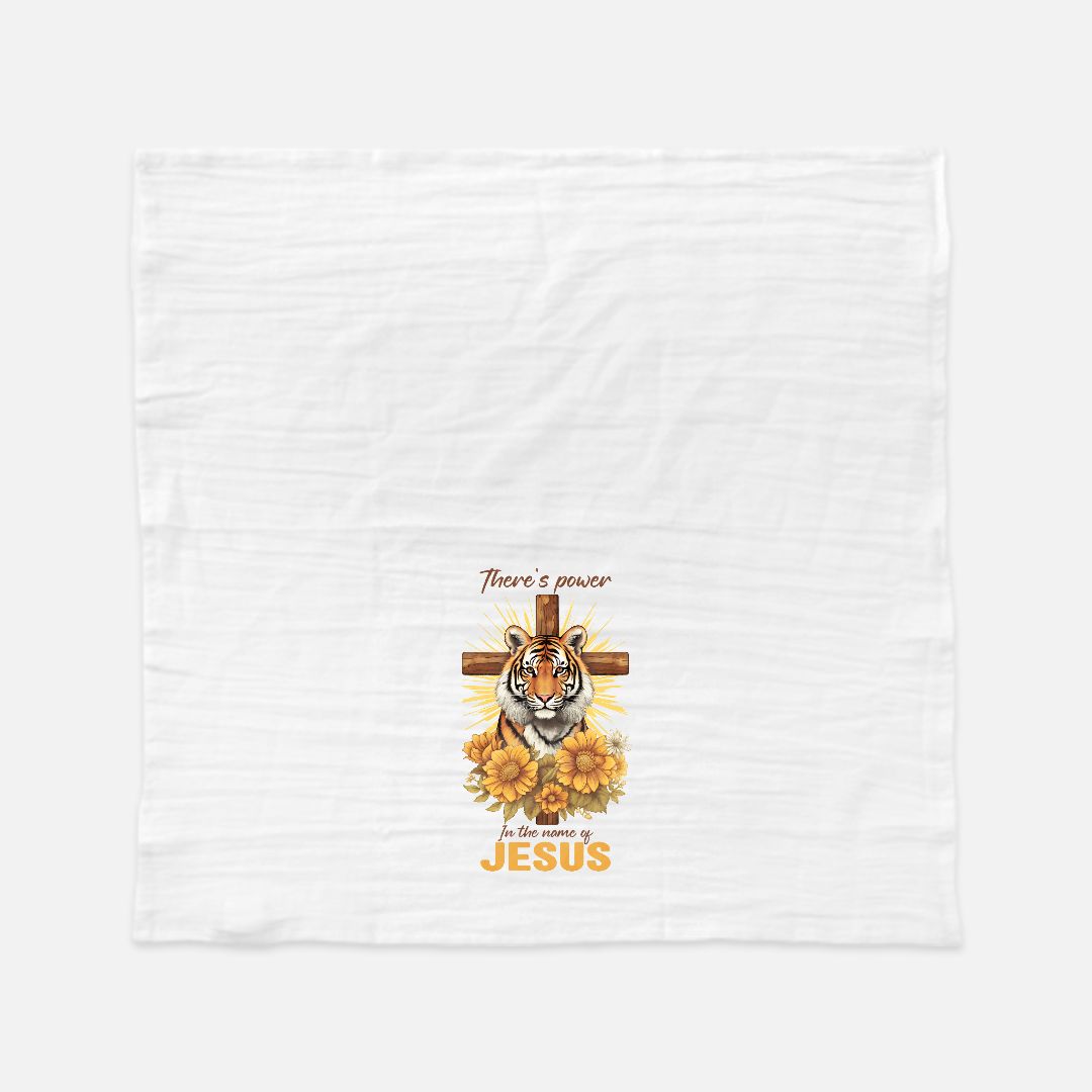 White tea towel with a tiger, cross, and sunflower design on a white background