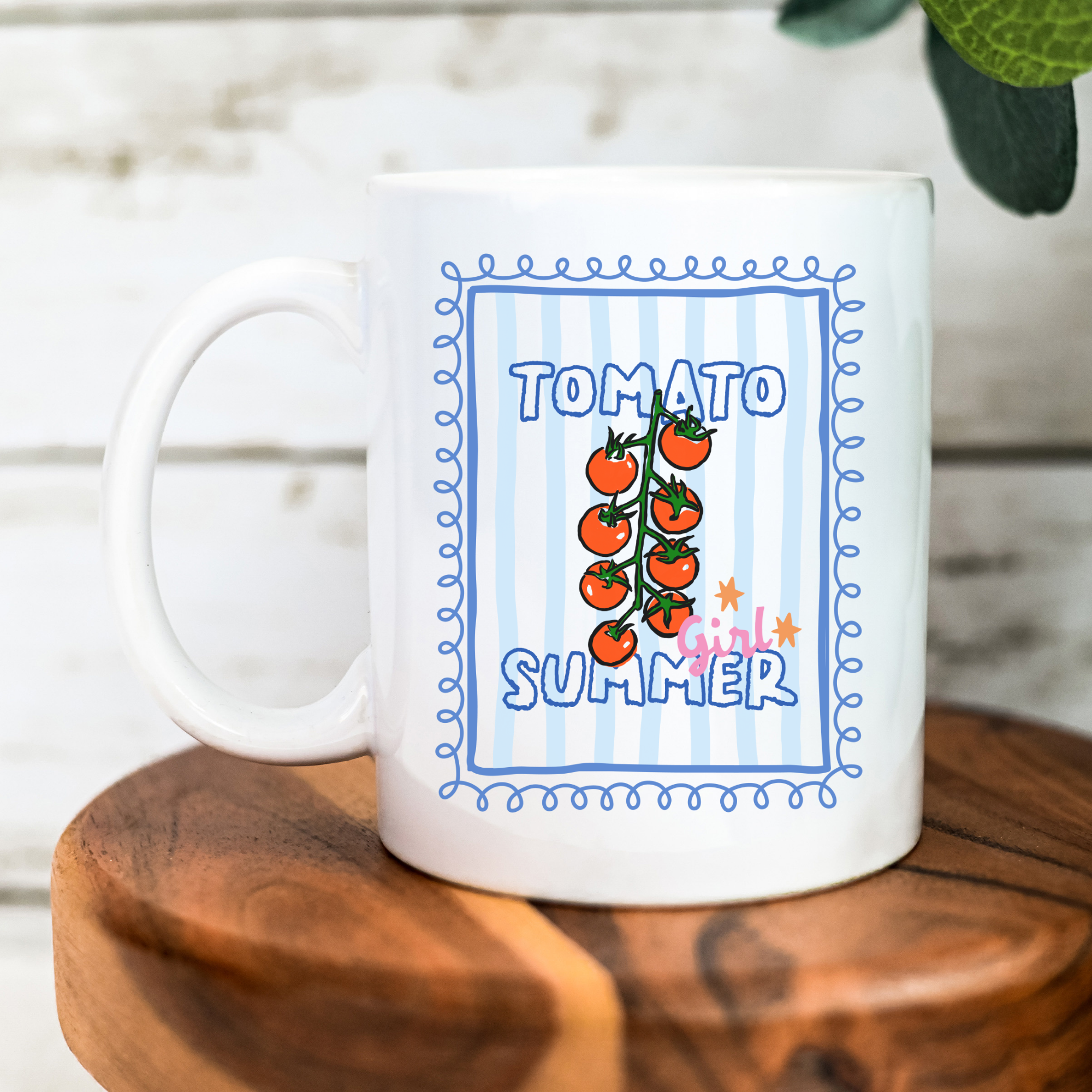 White 11oz. mug with 'Tomato Girl Summer' design on a wooden surface