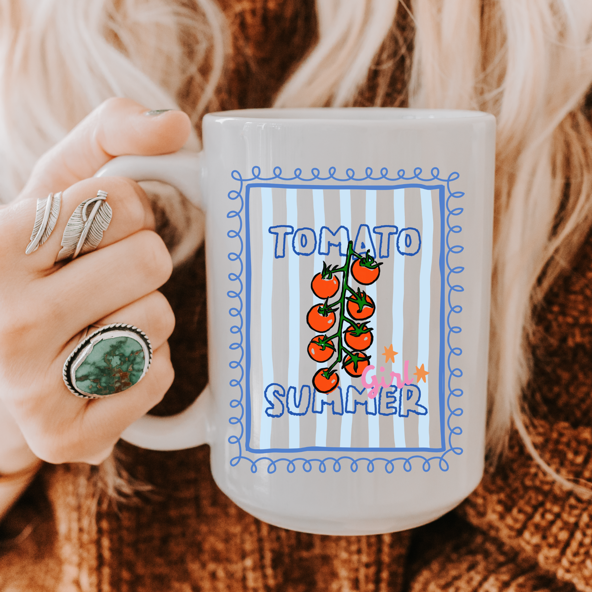 Person holding a 15oz. mug with 'Tomato Summer' design on a textured surface