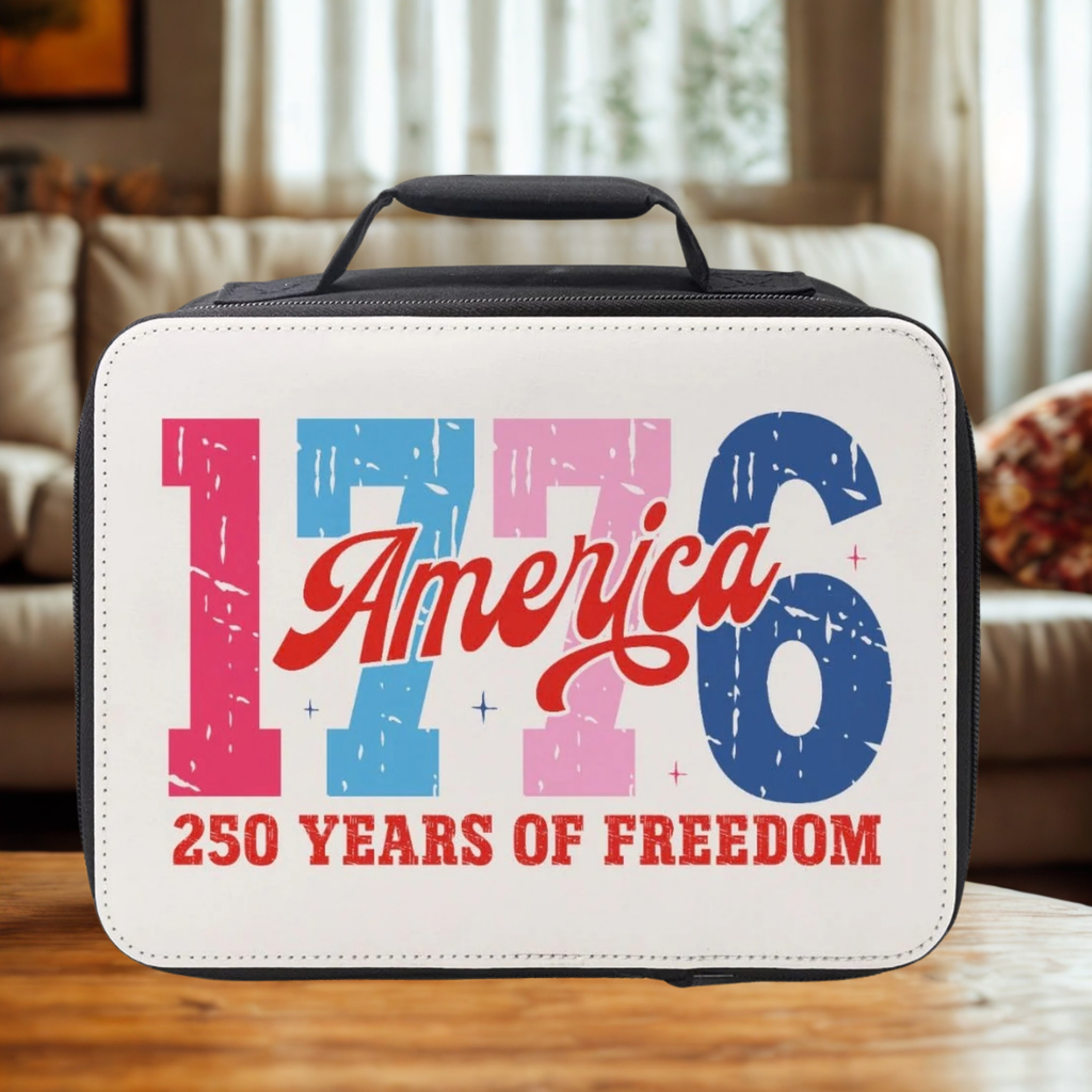 lunch bag with '1776 America 250 Years of Freedom' text on a wooden coffee table in a cozy living room.