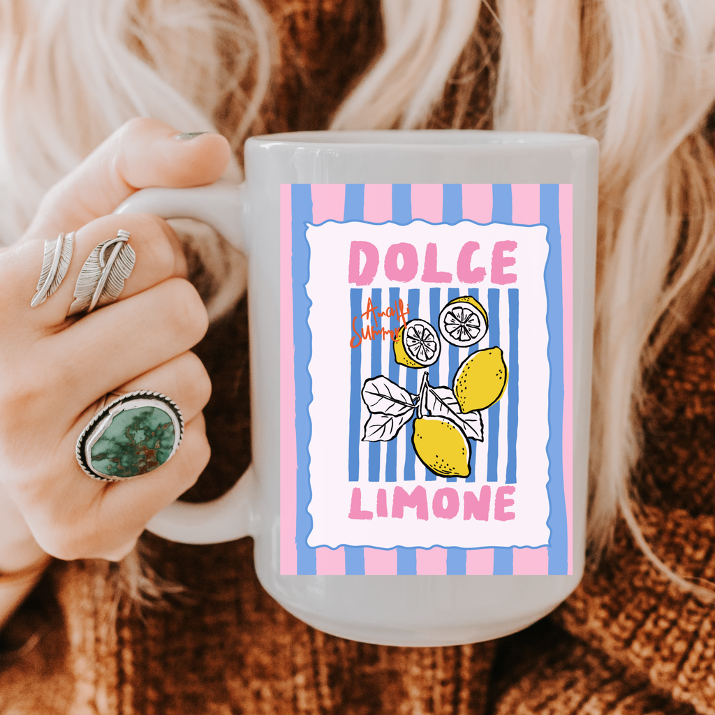 Person holding a 15oz. mug with a Dolce & Gabbana 'Dolce Limone' design.