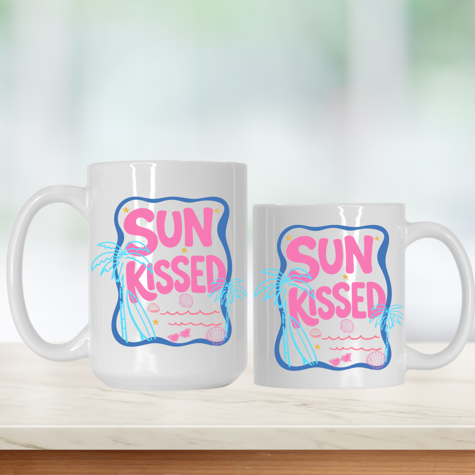 15oz. & 11oz. white mugs with 'Sun Kissed' design on a light background
