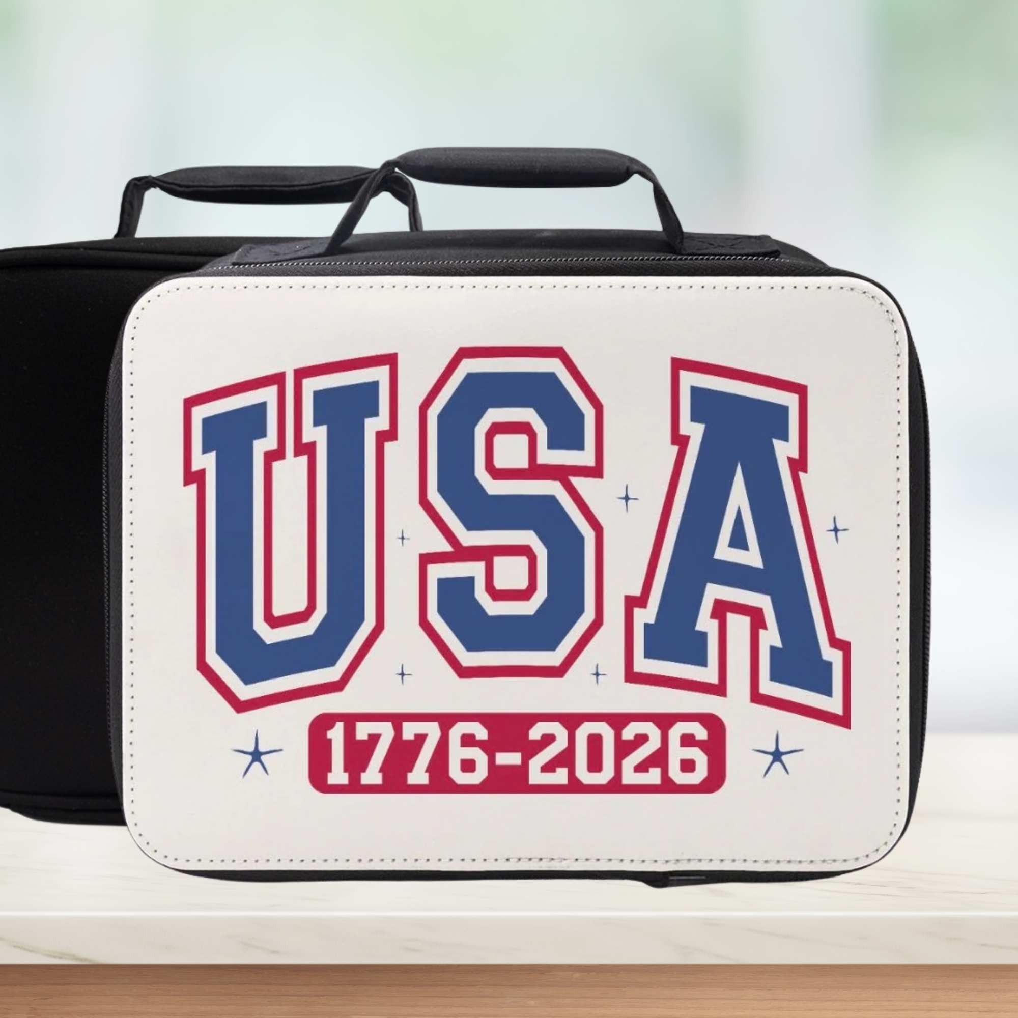 Lunch bag with 'USA 1776-2026' text on a blurred background