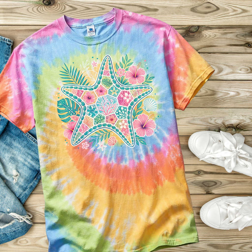 Colorful tie-dye t-shirt with a starfish design on a wooden surface.