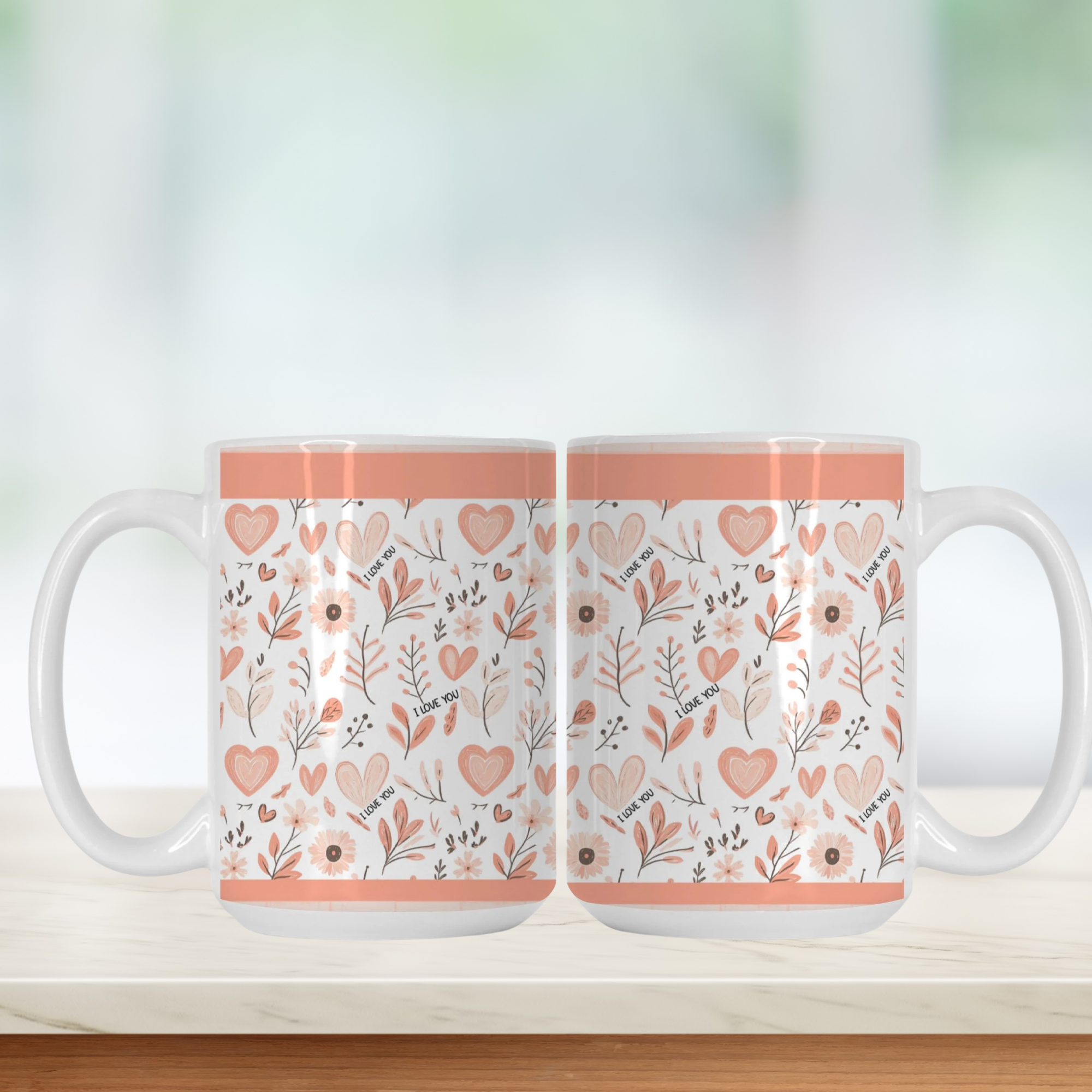 Two mugs with floral and heart pattern on a white background
