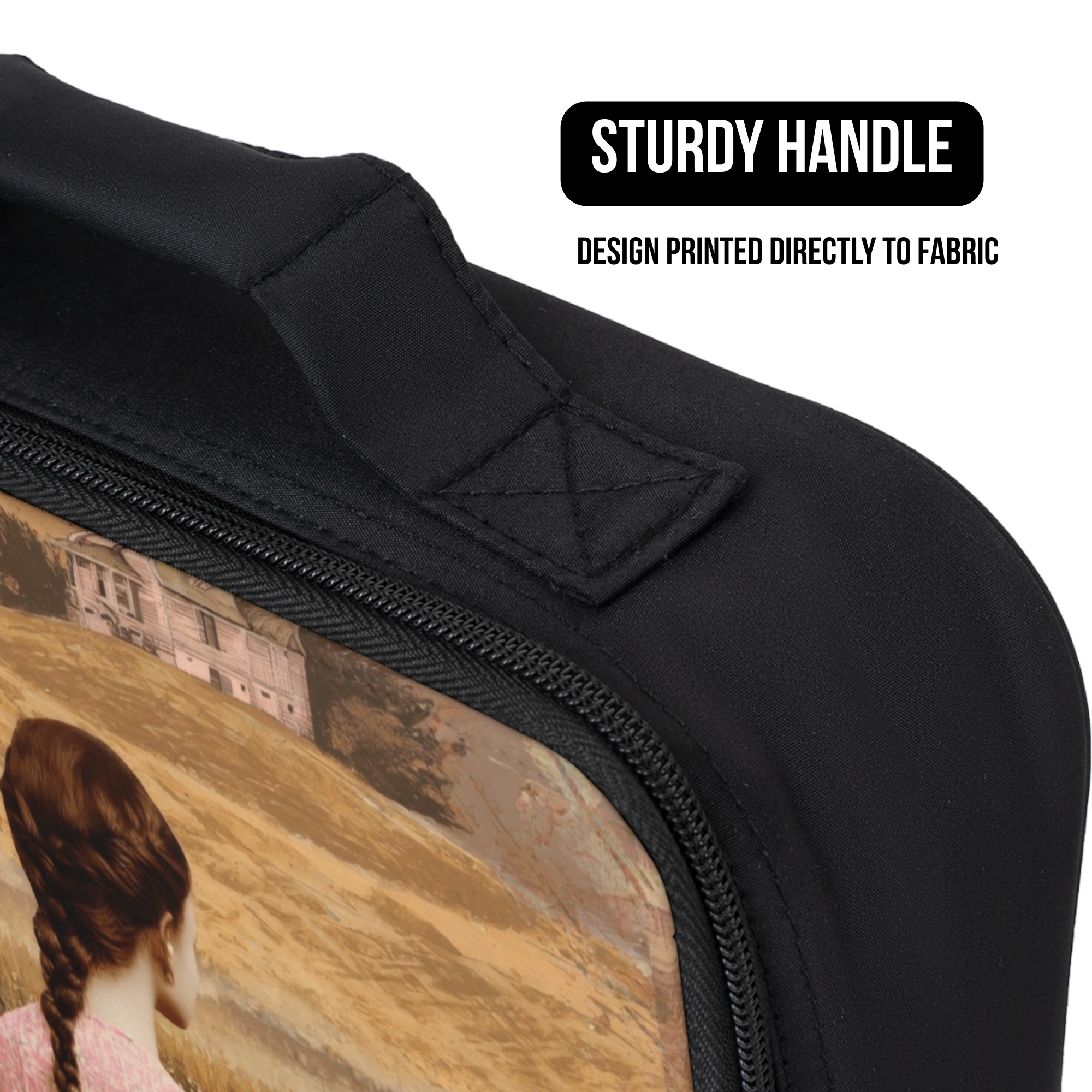 Black lunch bag with a design of a girl in a field and text about a sturdy handle and printed fabric.