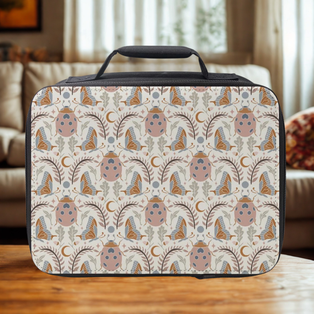 Vintage insect patterned lunch bag on a wooden table with a blurred indoor background