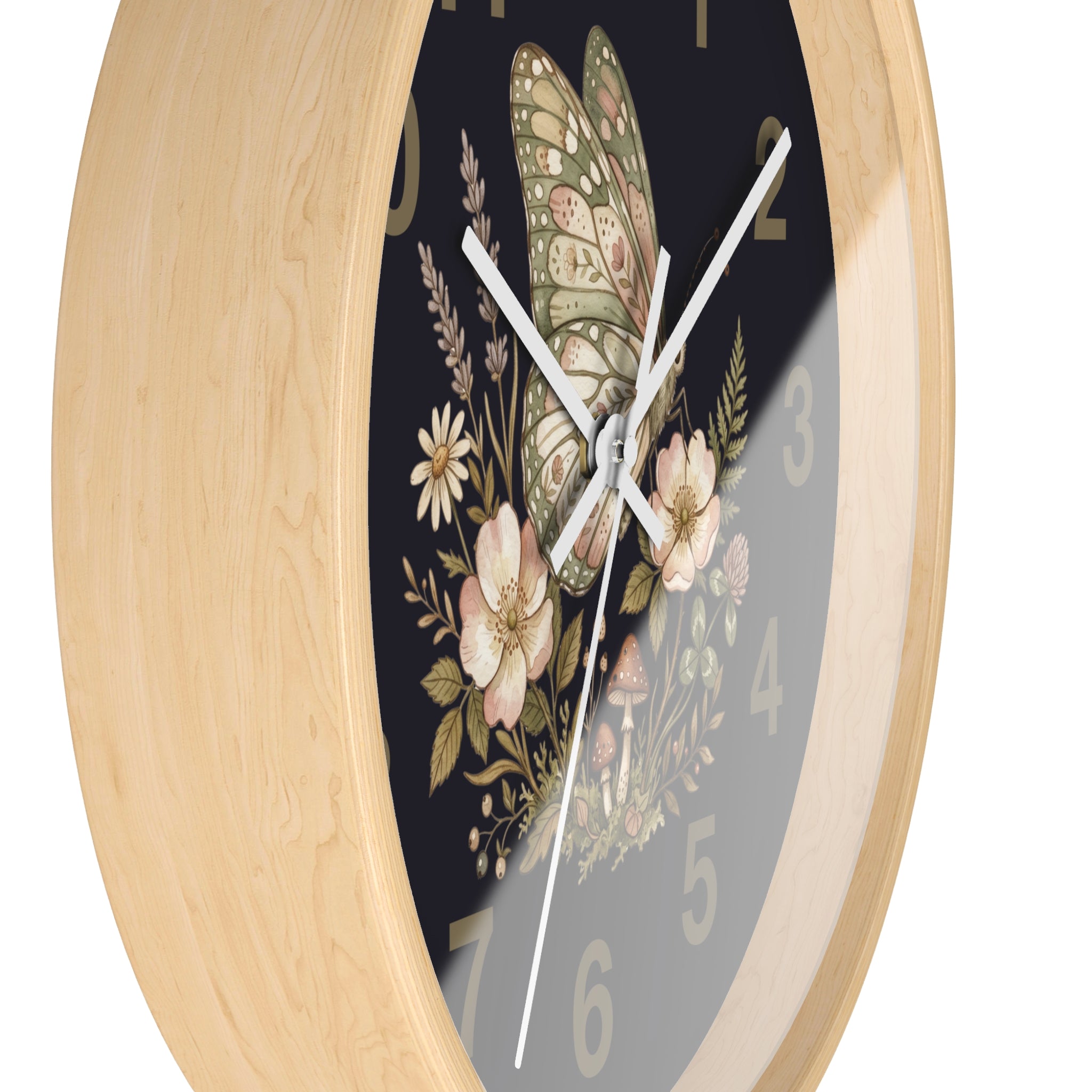 Side of natural wood wall clock with butterfly floral design on a black background