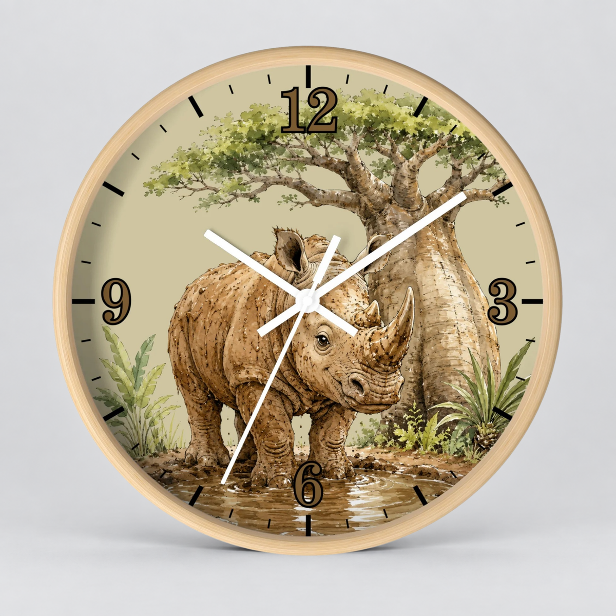 Round wall clock with a light wood frame and a safari-themed illustration featuring a rhinoceros, acacia tree, and plants on the dial. The clock has black Arabic numerals and white hands against a light gray background.