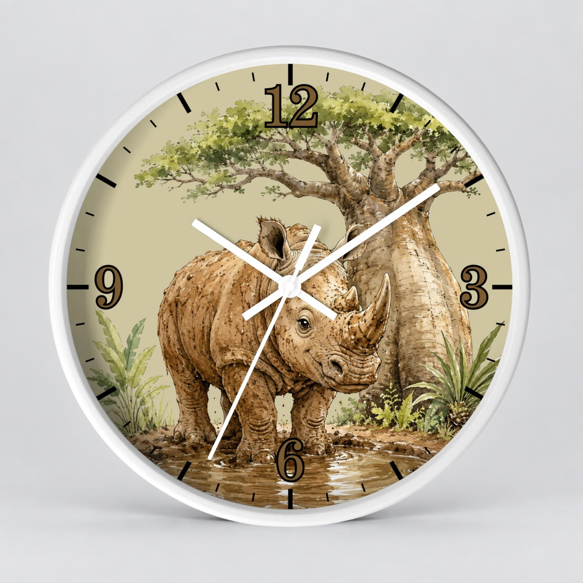 Round wall clock with a white frame and a safari-themed illustration on the dial, featuring a rhinoceros, acacia tree, and numerals in black with gold-toned details.