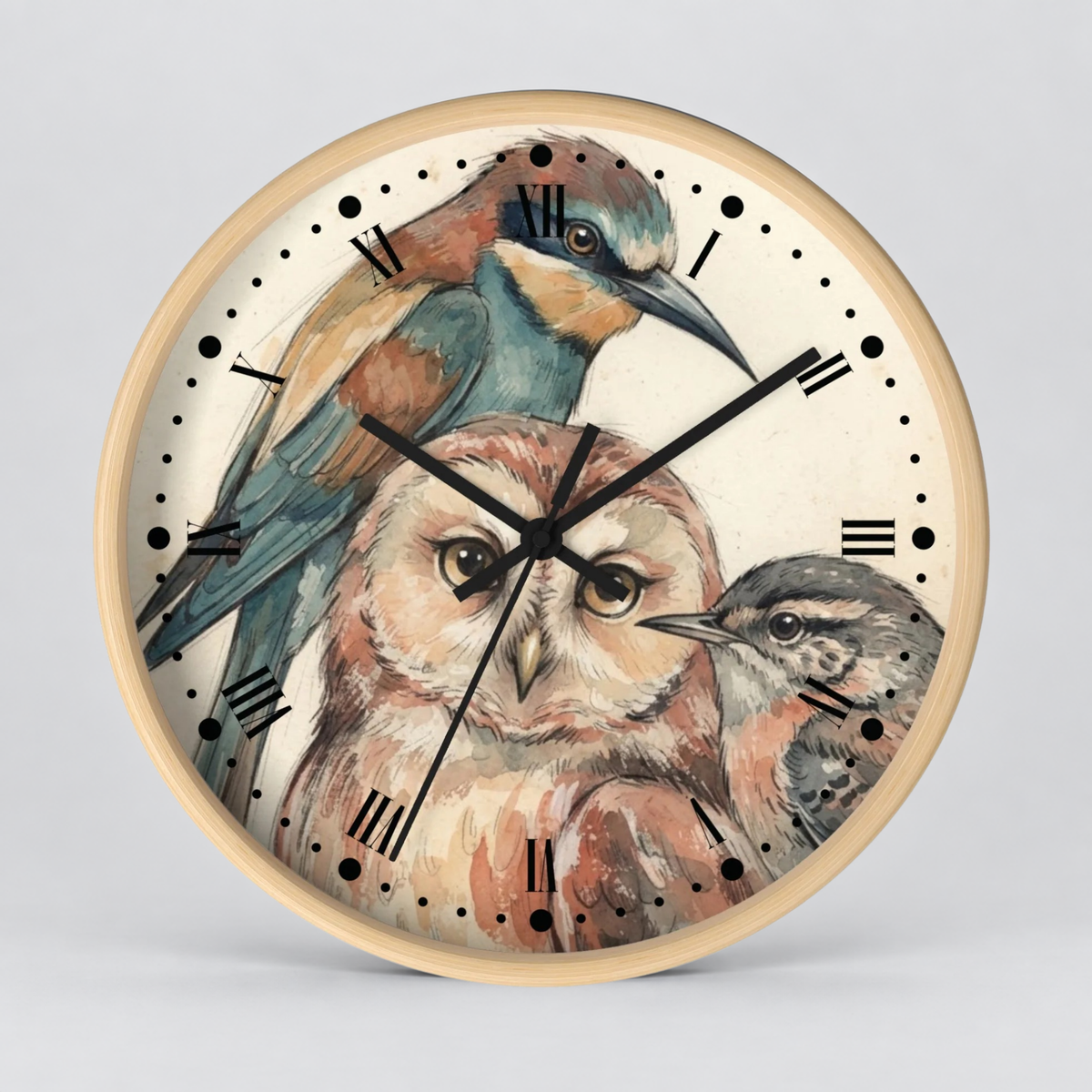 A round wall clock with a light wood frame and a printed bird illustration on the face. The artwork shows a large owl in the center with a bluebird and another small bird around it.