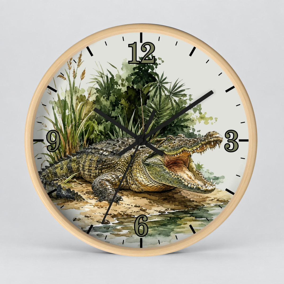 Round wall clock with a light wood frame and a printed alligator illustration on the face, with black numerals and hands, shown against a light gray background.