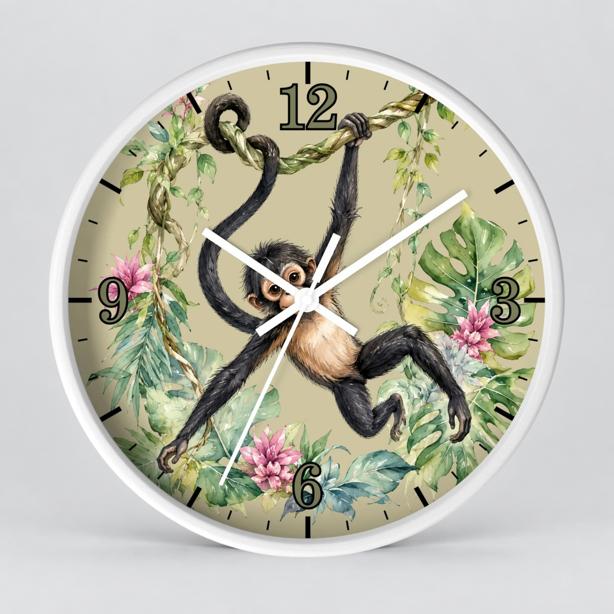 A round wall clock with a white frame and a tropical jungle illustration featuring a spider monkey hanging from a vine, green leaves, pink flowers, and black Arabic numerals on a light beige background.