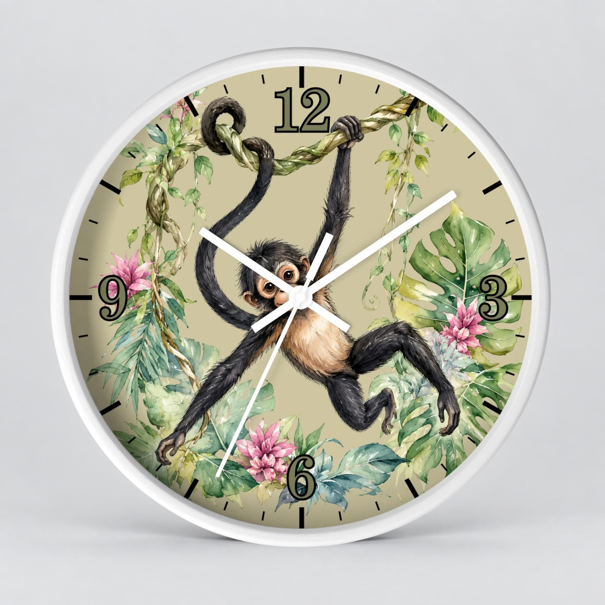 Round wall clock with a white frame and a vintage-style jungle illustration featuring a hanging spider monkey, green leaves, pink flowers, and black Arabic numerals on a light beige background.