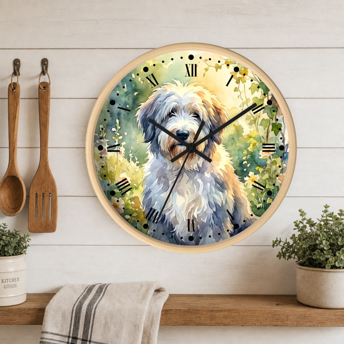 Round wall clock featuring a painted fluffy dog portrait on the face, mounted on a white wood plank wall above a wooden shelf with plants and kitchen utensils.