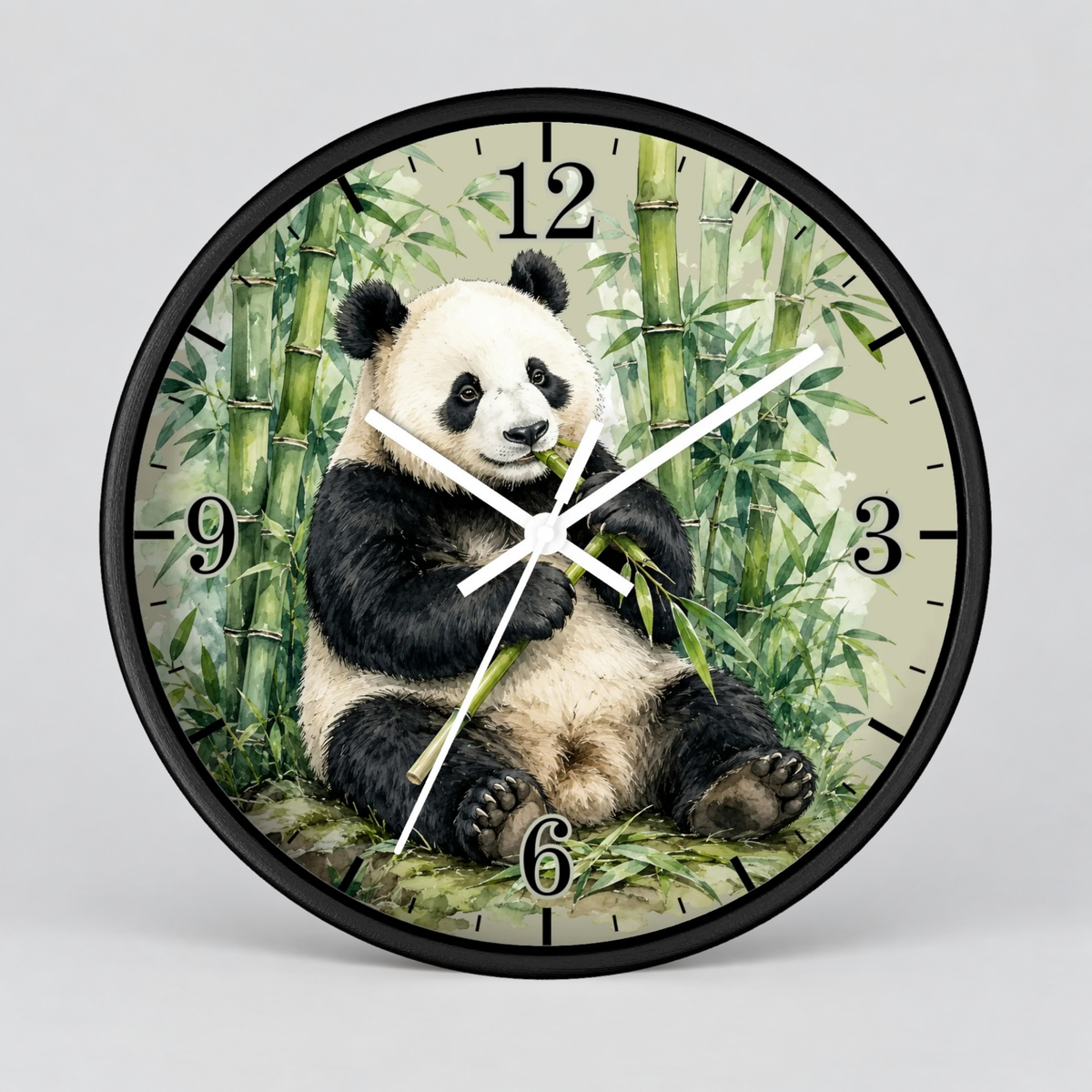 A round wall clock with a black frame and a printed panda illustration on the face, shown against a light gray background.