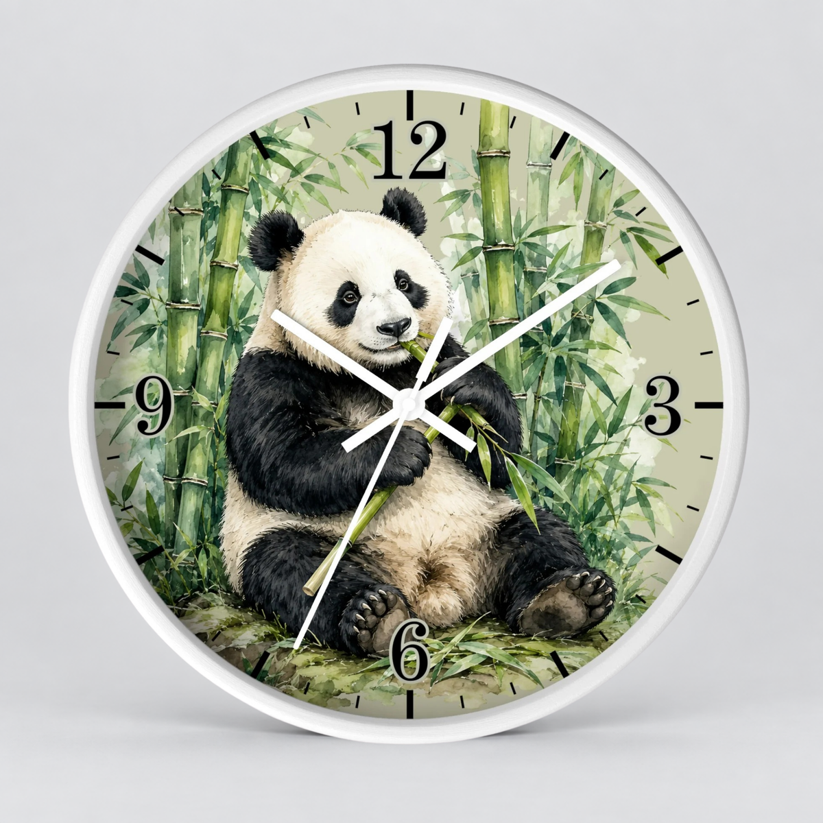 Round wall clock with a white frame and a printed panda sitting among bamboo graphics on the clock face, with black Arabic numerals and white clock hands, shown on a light gray background.