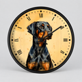 A round wall clock with a black frame and a printed dog portrait on the face. The clock has black Roman numerals and black hands, photographed against a light gray studio background.
