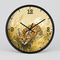 Round wall clock with a black frame and a printed design of a spotted big cat in tall golden grass, with black Arabic numerals and black clock hands on a light gray background.
