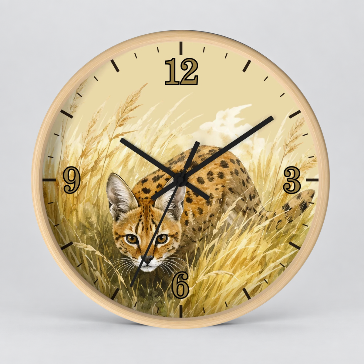 Round wall clock with a light wood frame and a printed illustration of a spotted big cat in tall golden grass, with black numerals and hands on a light gray background.