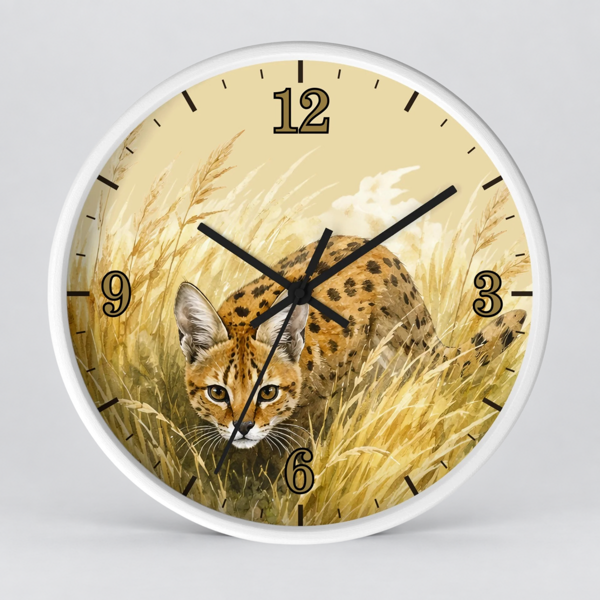 Round wall clock with a white frame and a printed safari scene on the face, showing a spotted big cat walking through golden grass. The clock has black Arabic numerals and black hands on a light gray background.