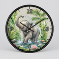 A round wall clock with a black frame and a printed illustration of a gray elephant standing in water among palm leaves and flowers. The clock face is light beige with black Arabic numerals and black clock hands, shown against a light gray background.