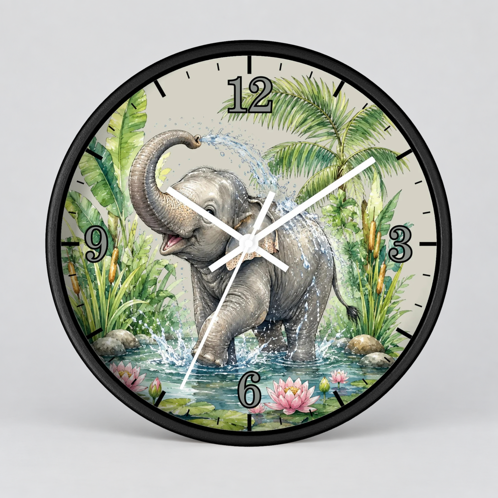 Round wall clock with a black frame and a printed illustration of an elephant standing in water with palm trees and flowers. The clock face has black Arabic numerals and white hands, shown against a light gray background.