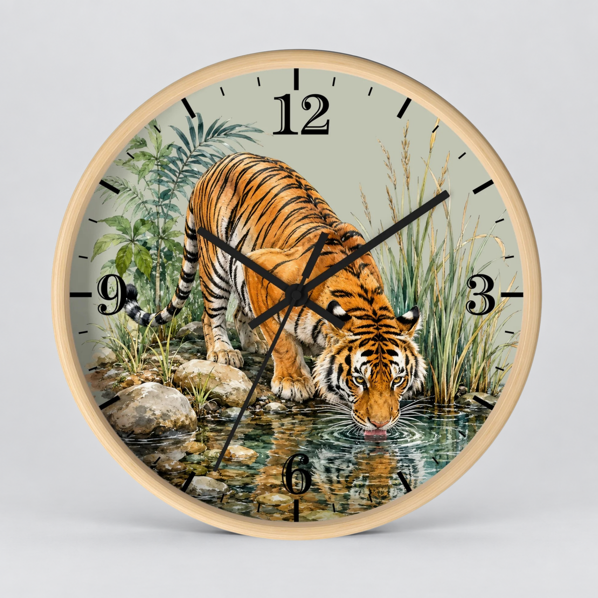 Round wall clock with a light wood frame and a printed illustration of a tiger drinking water, with black Arabic numerals and black clock hands, shown on a light gray background.