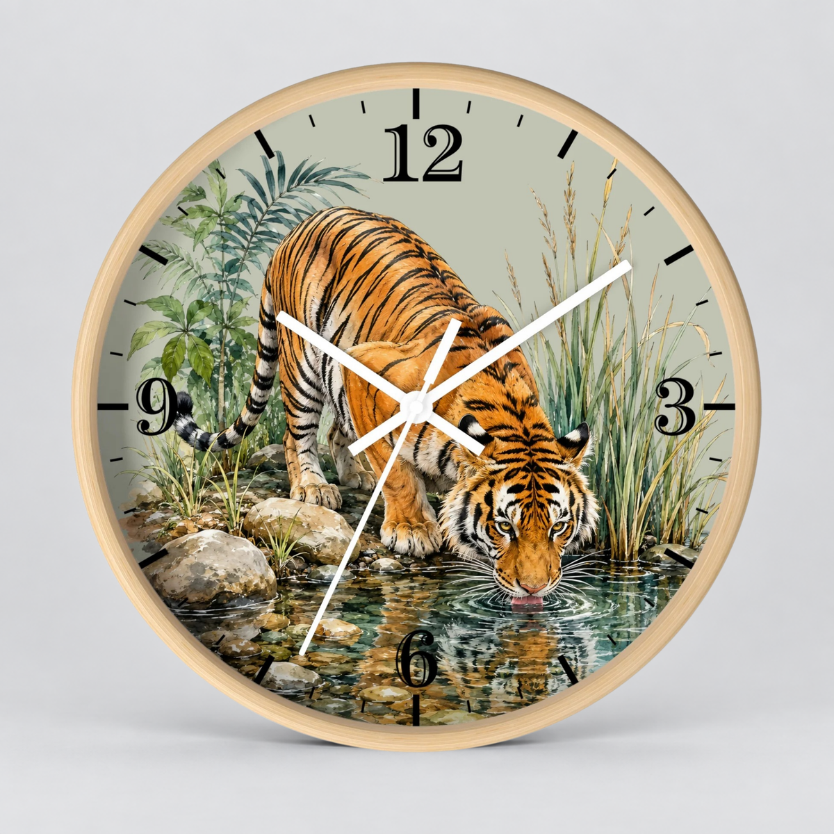 Round wall clock with a light wood frame and a printed illustration of a tiger drinking water, with black Arabic numerals and white hands, shown on a light gray background.