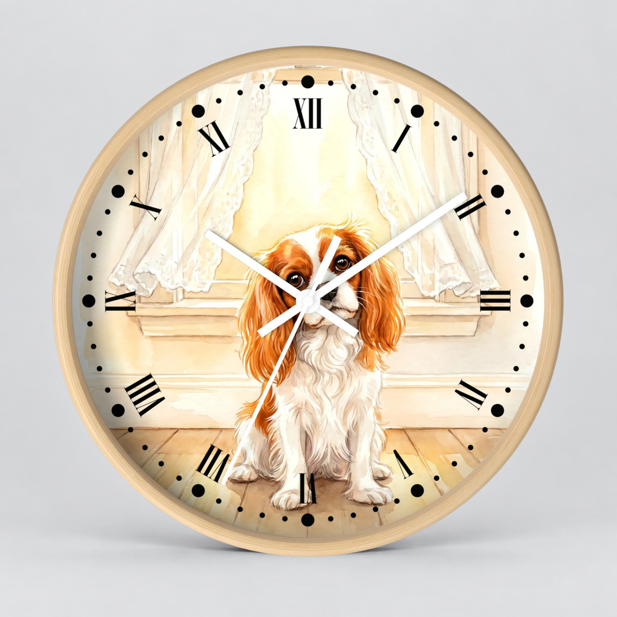 Round wall clock with a light wood-toned frame and a printed face showing a Cavalier King Charles Spaniel dog sitting in front of white curtains and a window. The clock has black Roman numerals, black hour markers, and white hands against a light gray background.