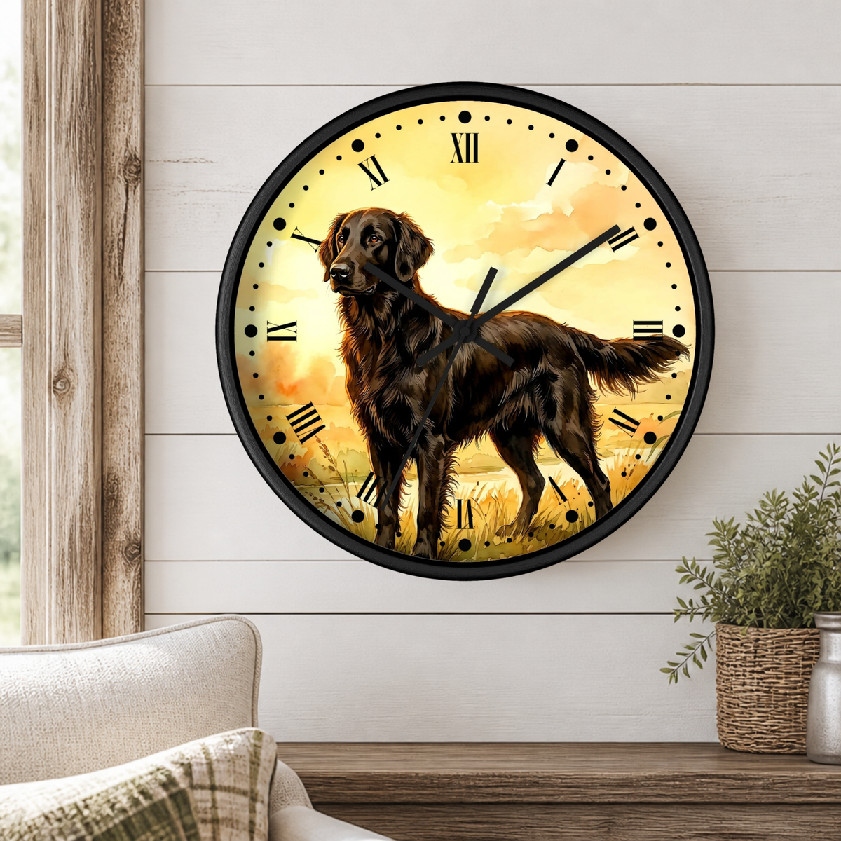 A round wall clock with a black frame and Roman numerals, featuring an illustration of a brown retriever dog standing in a golden field. The clock is mounted on a white wood-paneled wall above a wooden shelf with a potted plant and part of a sofa visible.