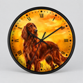 Round wall clock with a black frame and a printed illustration of a long-haired red dog against a glowing yellow-orange background, with black Roman numerals and hands.