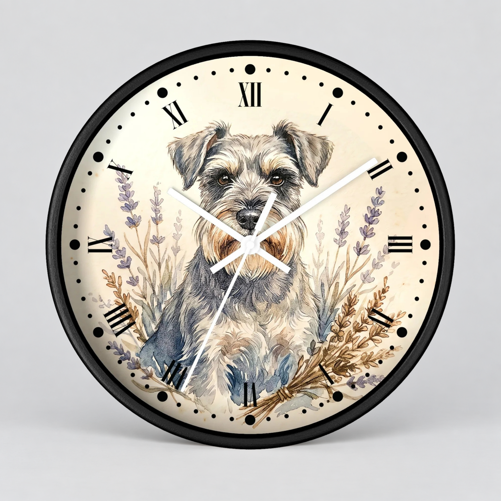 Round wall clock with a black frame and a cream-colored face featuring an illustration of a terrier dog surrounded by lavender and wheat stems, with black Roman numerals and white hands.