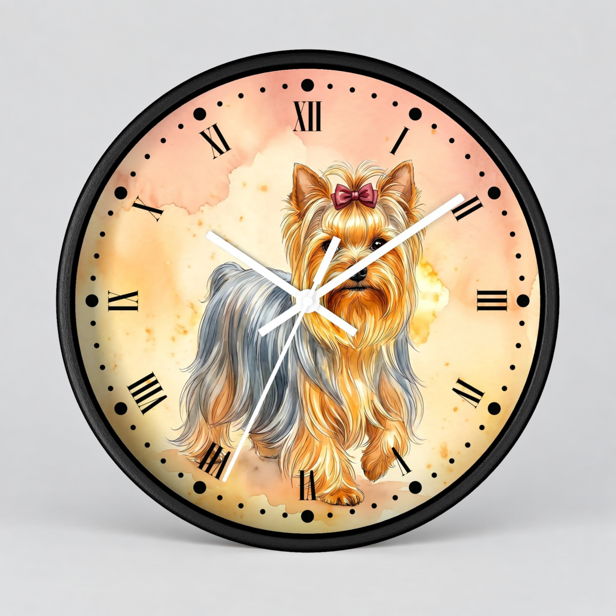 Round wall clock with a black frame and a watercolor-style illustration of a Yorkshire Terrier on the face. The clock features a warm beige and peach background with black Roman numerals and white clock hands.