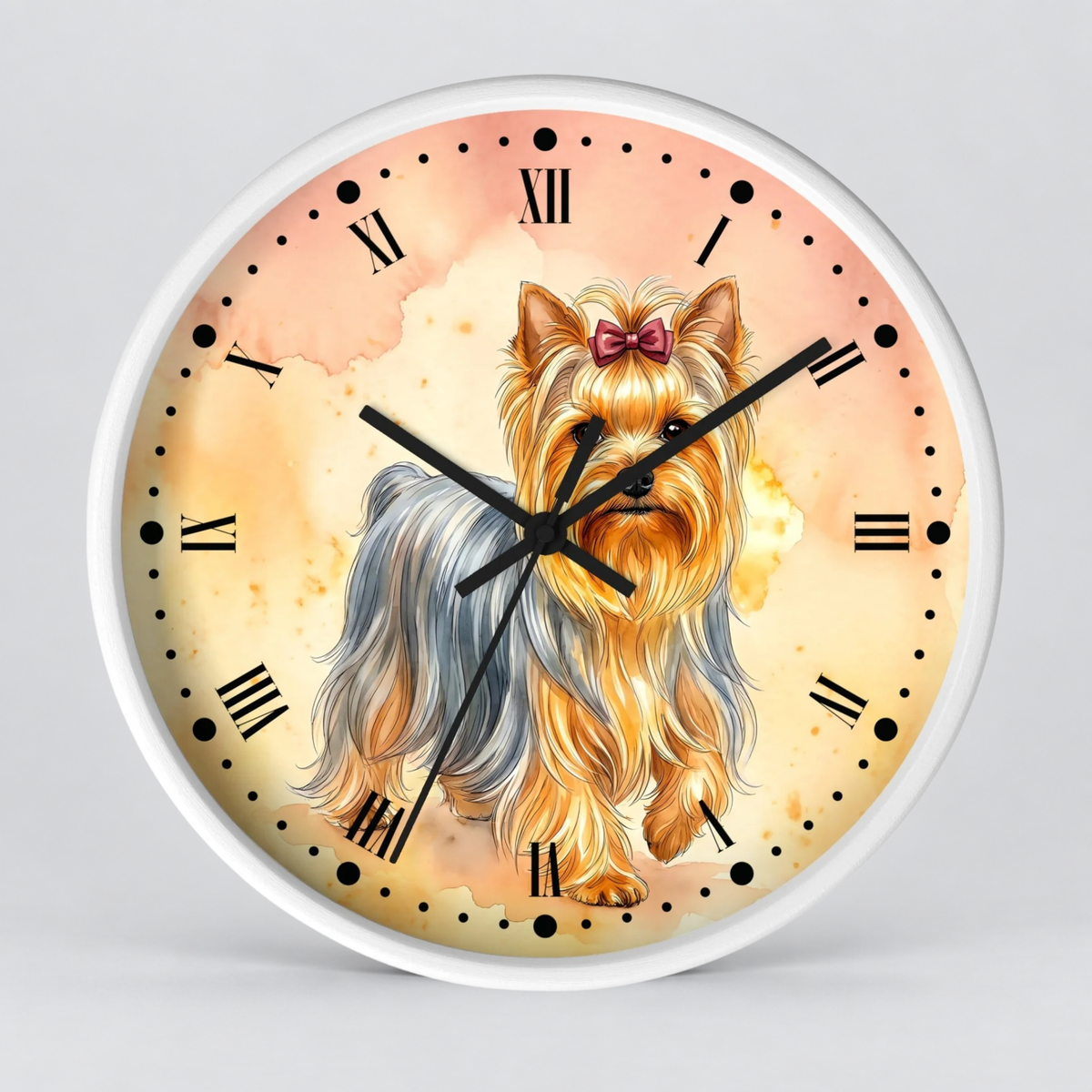 Round wall clock with a white frame and a printed illustration of a Yorkshire Terrier on the face. The clock features Roman numerals, black hands, and a soft watercolor-style background in warm peach, cream, and beige tones.