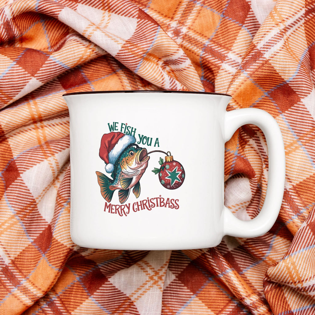 White mug with Christmas design on plaid fabric