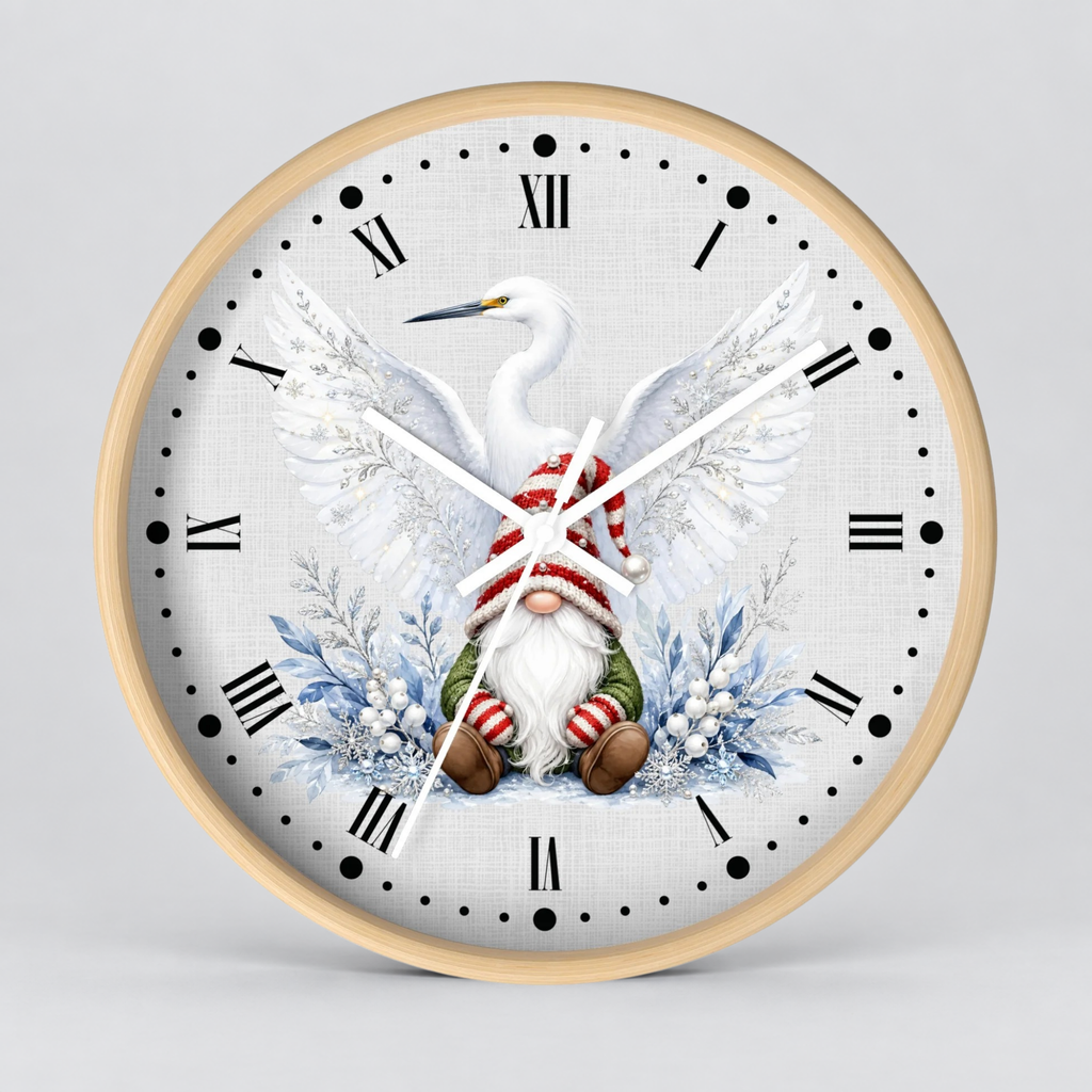 A round wall clock with a light wood frame and a white face featuring a festive illustration of a white heron with spread wings and a small gnome in red-and-white striped socks seated among blue winter foliage. Black Roman numerals and dot hour markers are visible on the clock face.