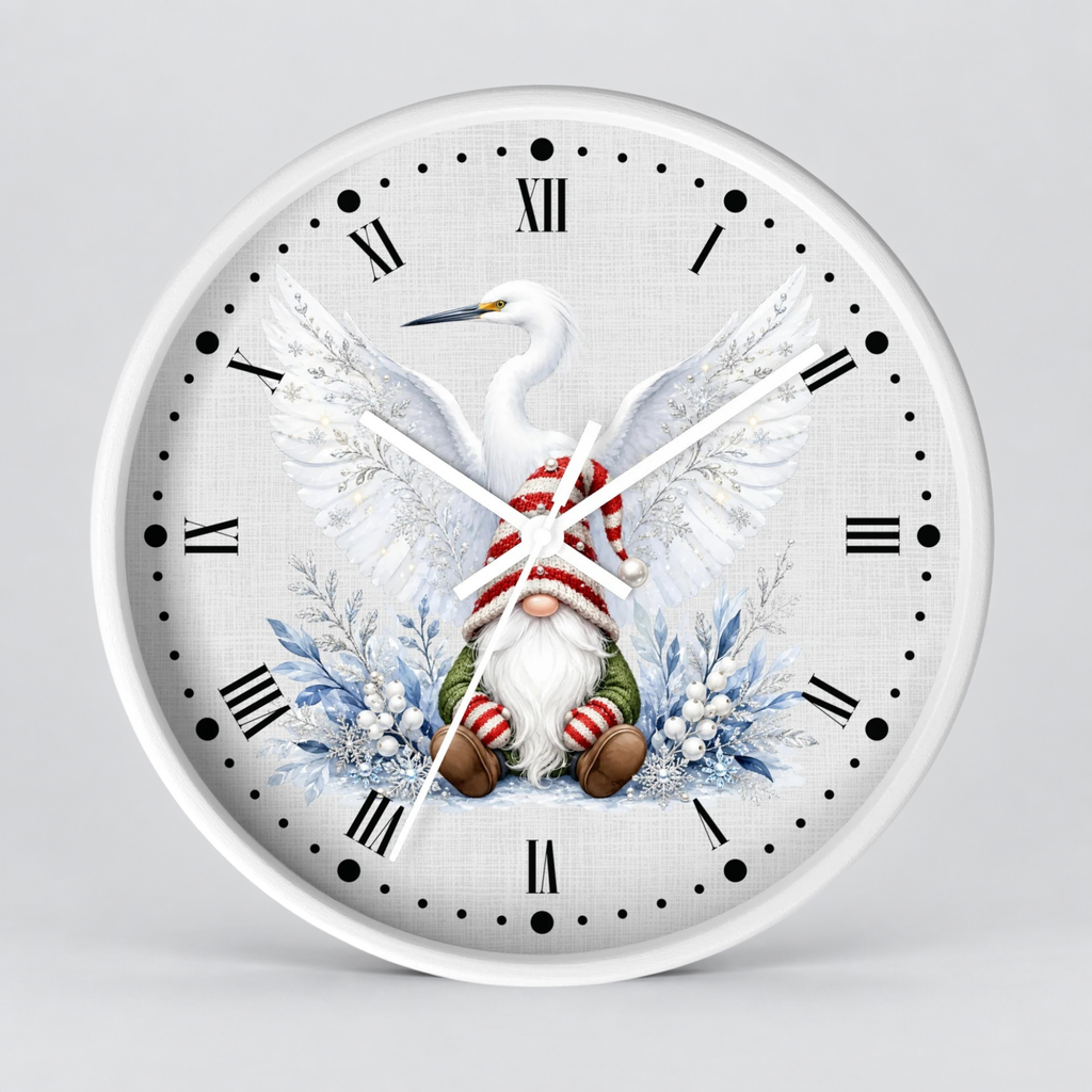 A round wall clock with a white face and white rim, featuring a festive illustration of a white heron with wings spread over a Christmas gnome wearing a red-and-white striped hat and green pants, surrounded by blue winter foliage. The clock uses black Roman numerals and white hands on a light gray background.