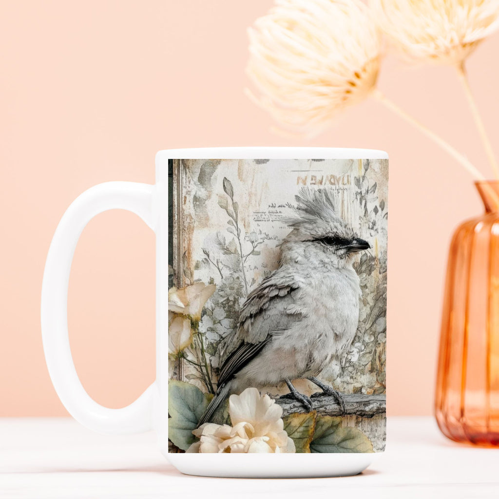 White mug with a bird design on a peach background