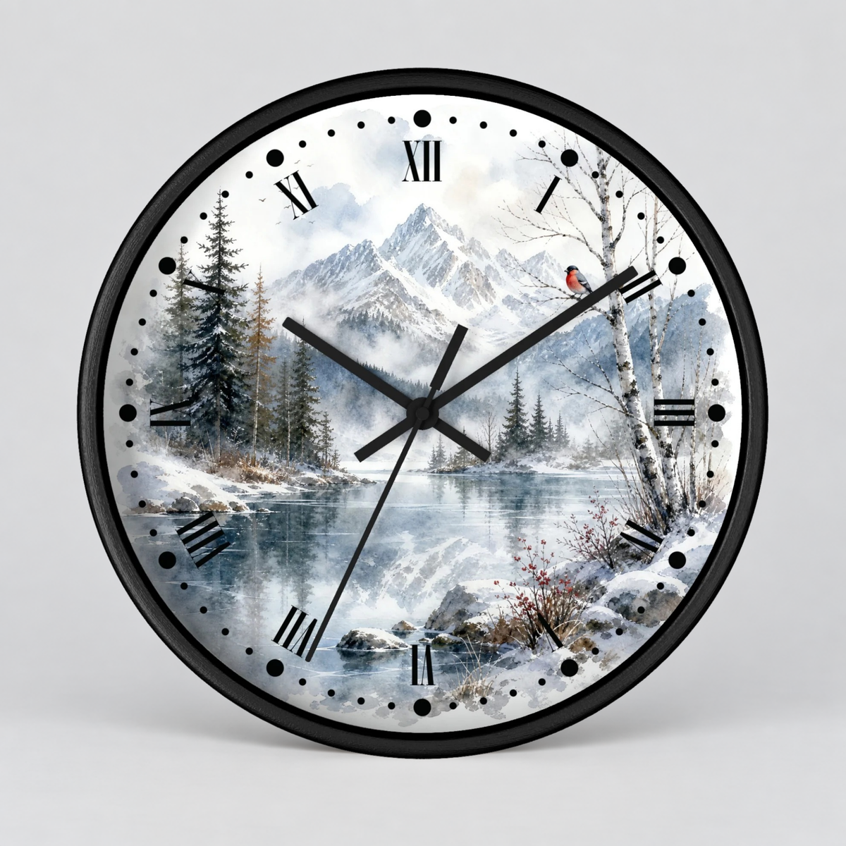 Round wall clock with a black frame and a winter landscape print featuring snow-covered mountains, pine trees, a reflective lake, and a small red bird, with black Roman numerals and hands on a light gray background.