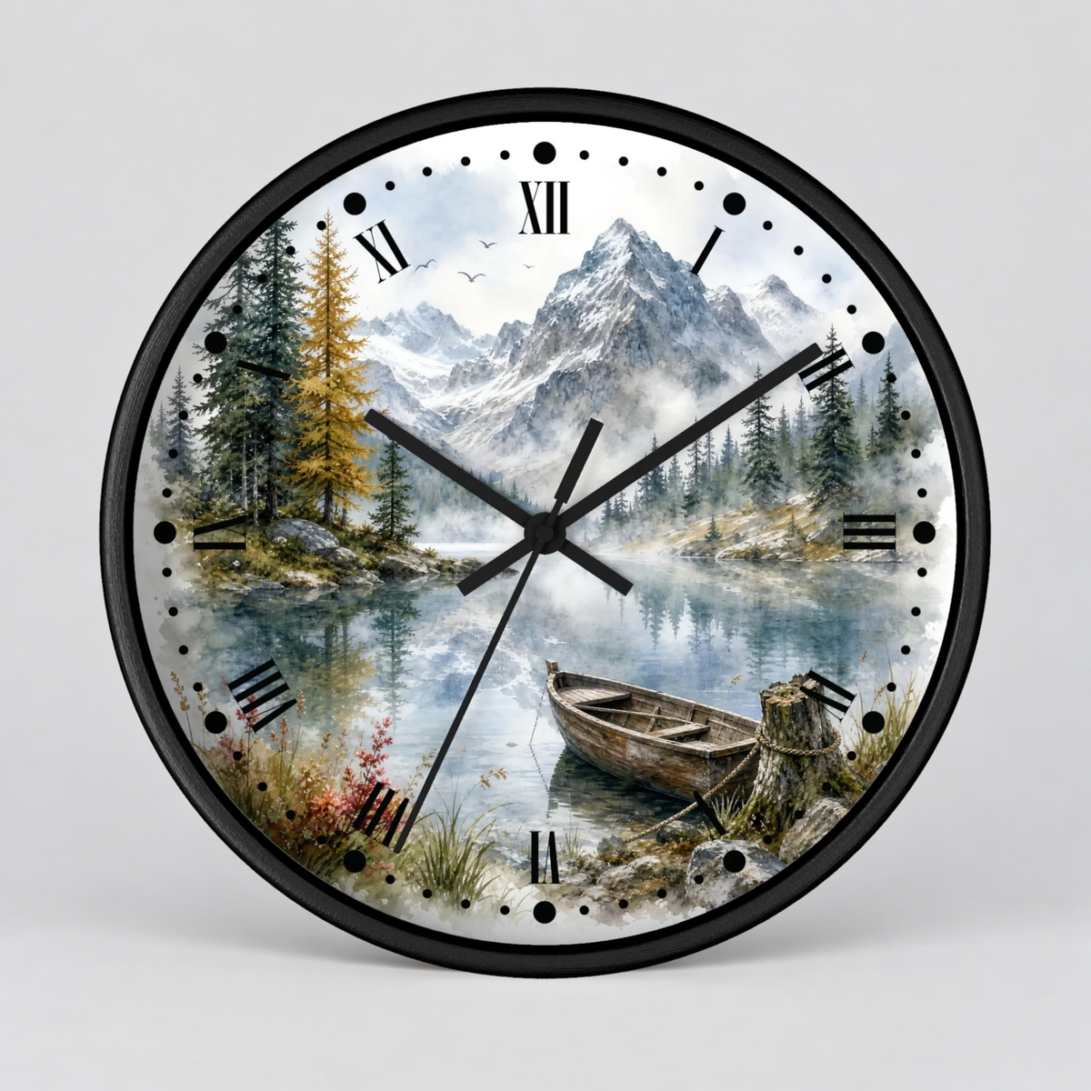 A round wall clock with a black frame and a scenic landscape print featuring mountains, pine trees, a calm lake, and a wooden boat. The clock face uses black Roman numerals and black hands, shown against a light gray background.