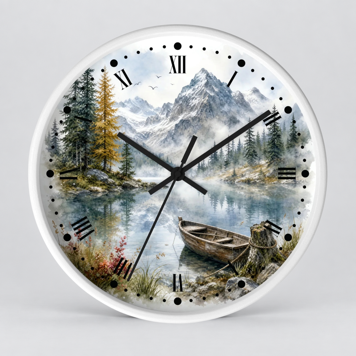 A round wall clock with a white frame and a scenic landscape print on the face, showing a mountain lake, pine trees, a small boat, and black Roman numerals and hands on a light gray background.