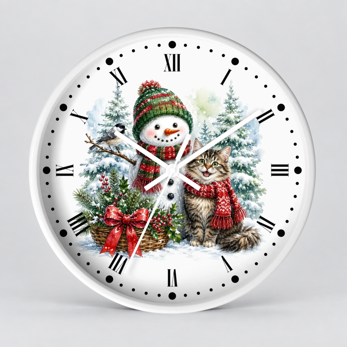 A round white wall clock with a festive Christmas illustration on the face, featuring a snowman, a tabby cat, evergreen trees, and a bird, with black Roman numerals and clock hands on a light gray background.