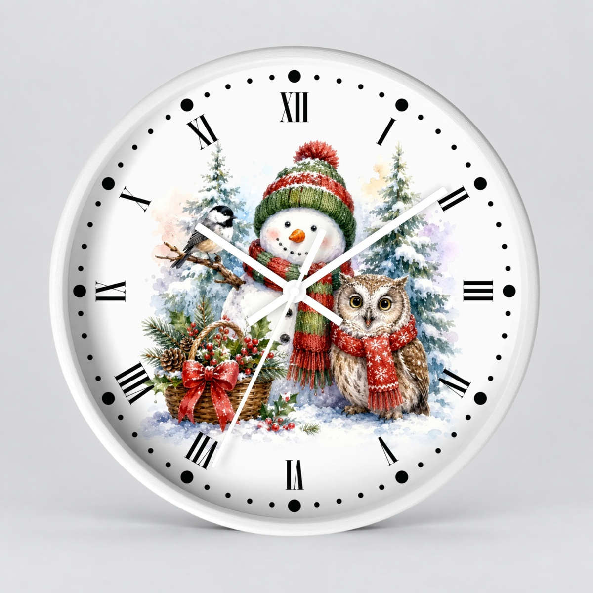 A round white wall clock with black Roman numerals and hands, featuring a festive Christmas illustration on the face with a snowman in a green and red hat, a brown owl in a red scarf, pinecones, and snowy trees, shown against a light gray background.