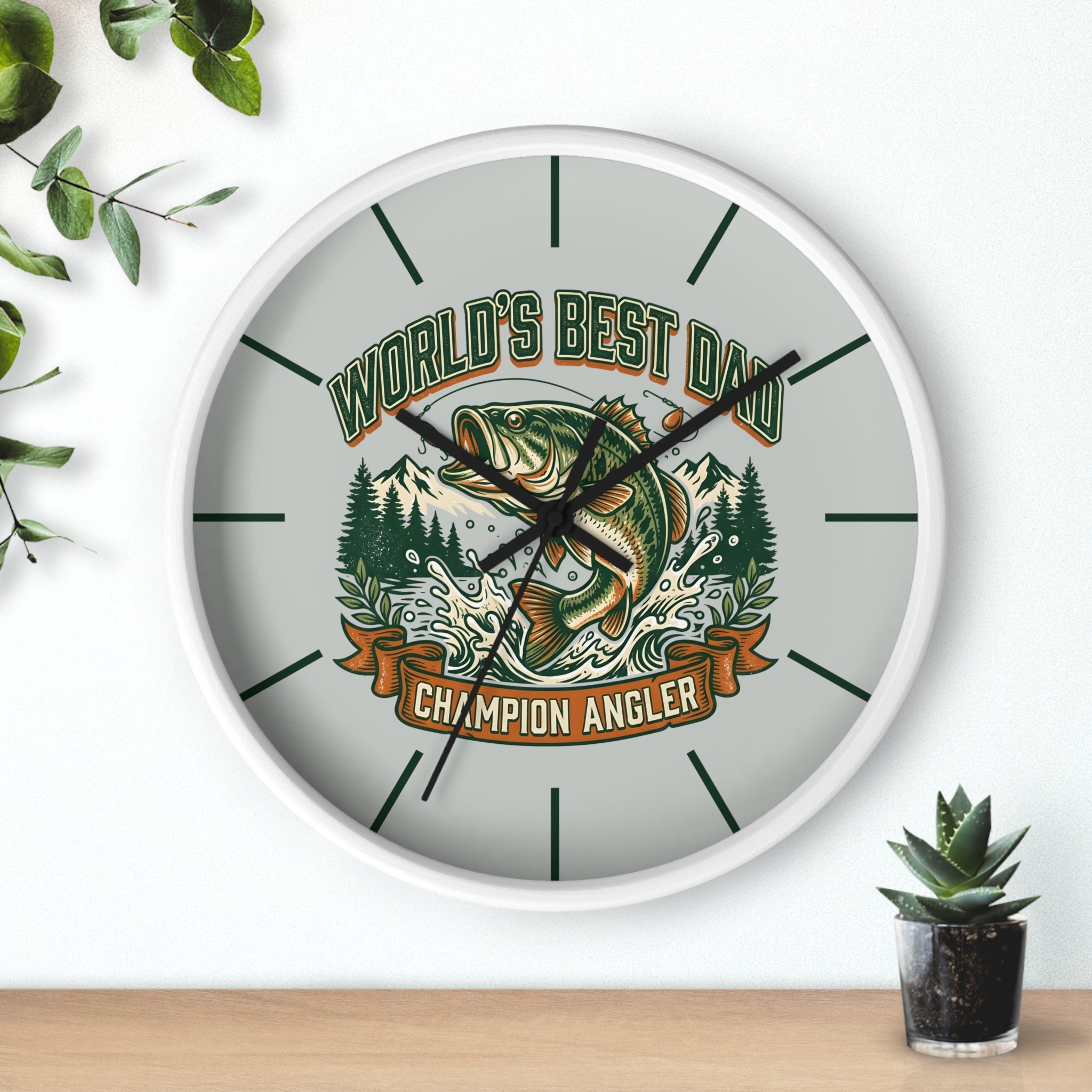 Round white wall clock with fishing design and text 'World's Best Dad, Champion Angler' on a white background.